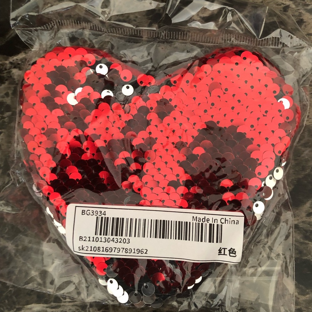 Sequence Heart shaped purse for little girls.
